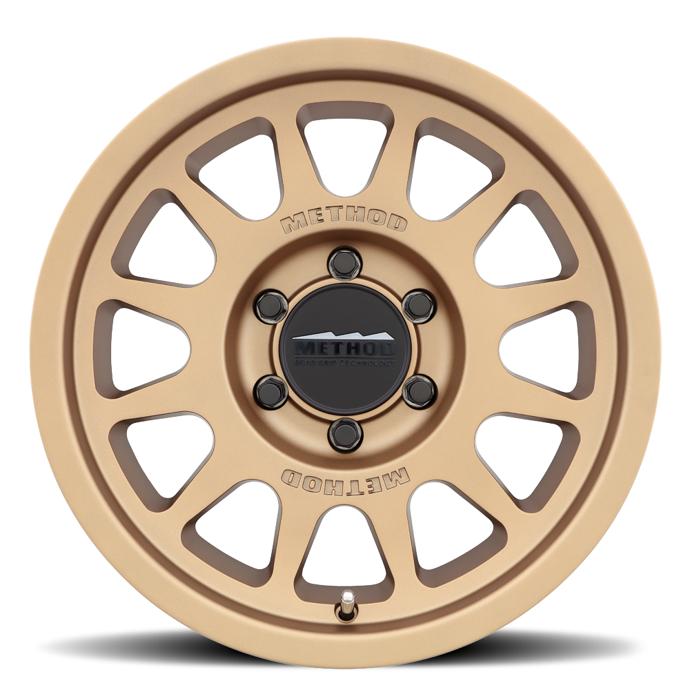 17x9 method race wheels mr703 bead grip bronze wheel 6x5.5 bolt pattern 12mm offset