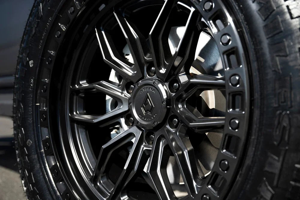 17x8 5 arena wheel a109 hustle glossy gun metal center satin black lip wheel 6x5.5 bolt pattern 25mm offset
